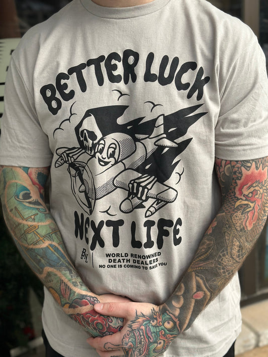 BETTER LUCK NEXT LIFE "DEATH DEALERS" TEE (Tan/Black)